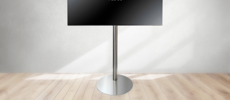 Always the right height for your television with a television stand from Vebos A television on a silver-coloured television stand.